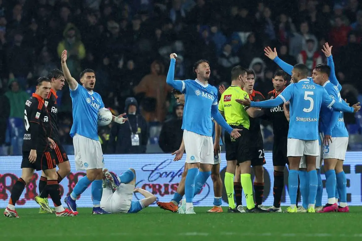 Napoli players celebrate after scoring against Como.